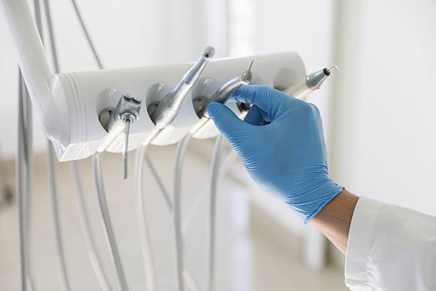 Professional Tooth Extraction technician working in El Paso, TX